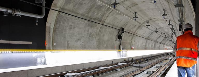 Man in Hi-Vis jacket in tunnel.