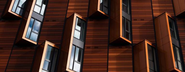 Wooden building with windows.
