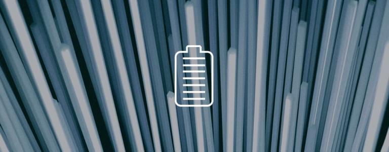 Shafts of light with a white Battery icon in the centre