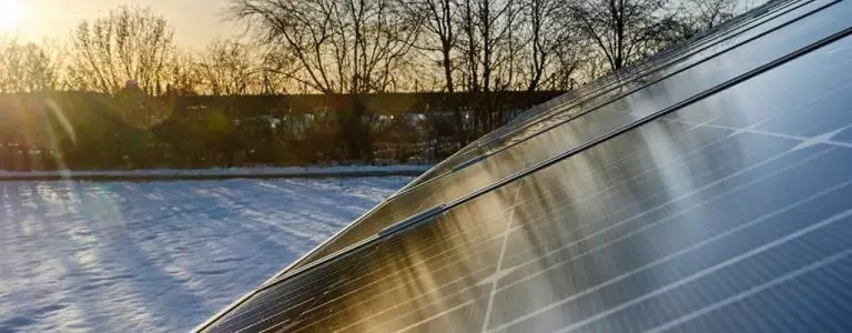 Do solar PV panels generate power in cold, snowy weather?